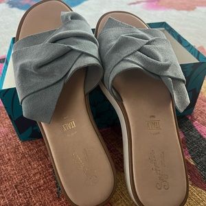 Seychelles sandal slides twist top suede tie. Color is coast midblue suede.